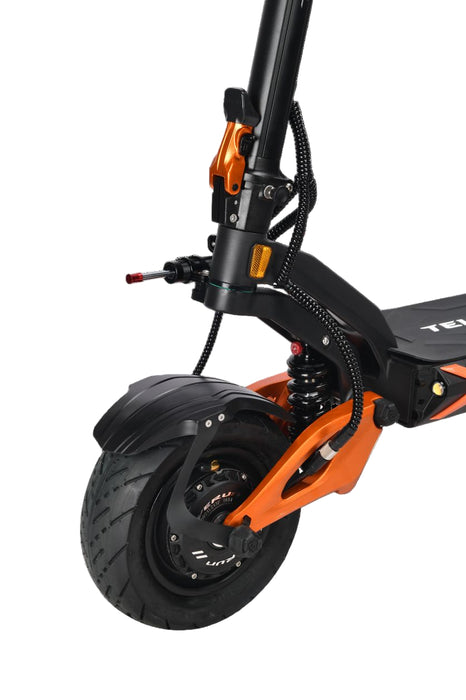 Close-up of an electric scooter with black and orange design on a transparent background