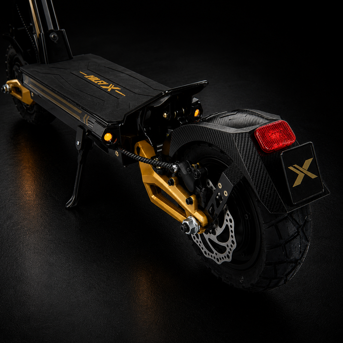 Black electric scooter with gold accents on a dark background