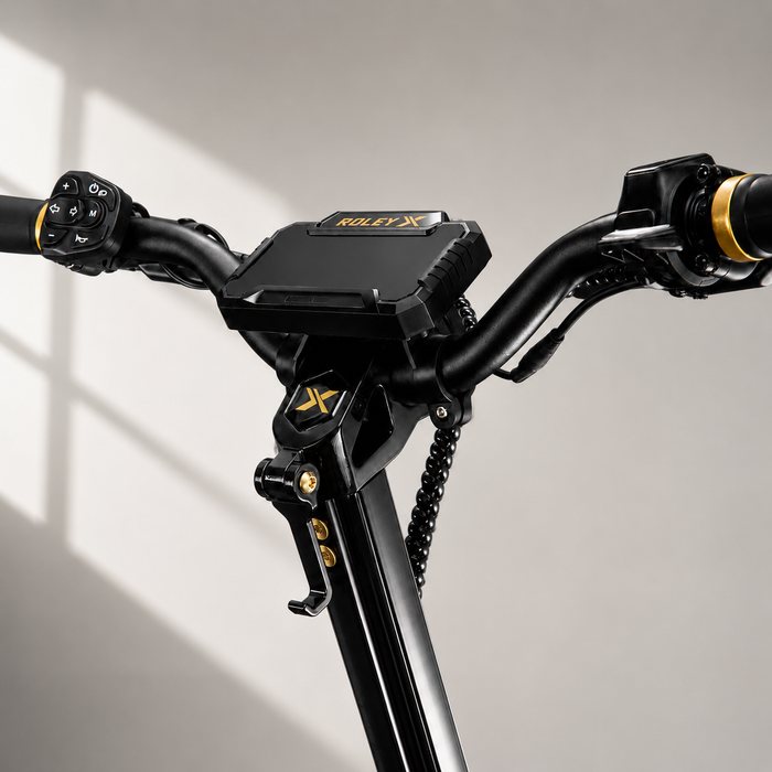 Close-up of a motorcycle handlebar with 'Kolexy' branding on a neutral background