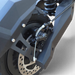 Close-up of the disc brake system and coil suspension on a black Electric Scooter Shop Punk Roamer Pro scooter.